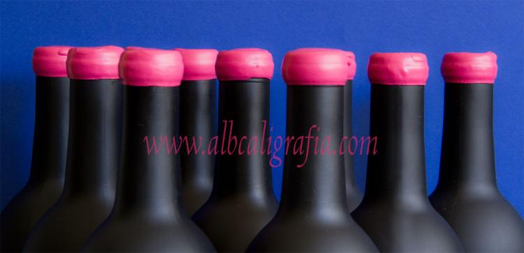 Black bottles with pink sealing wax