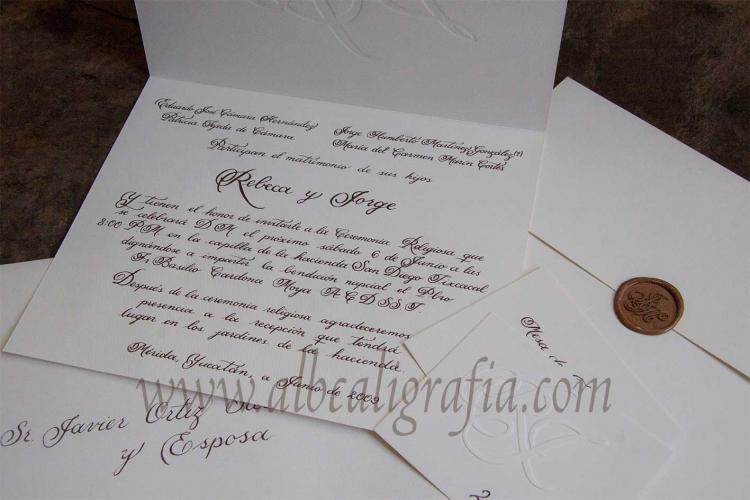 Wedding invitation in calligraphic style with cupper sealing wax