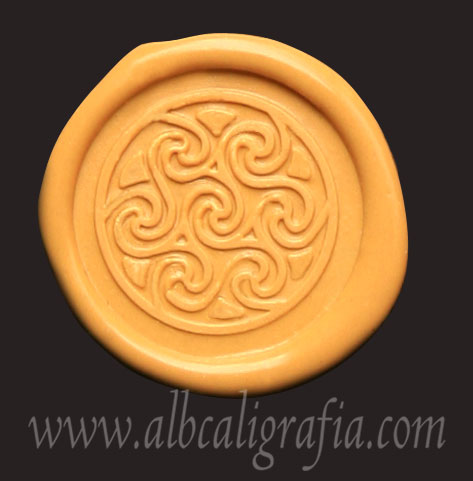 Yellow sealing wax sticker with celtic spirals seal