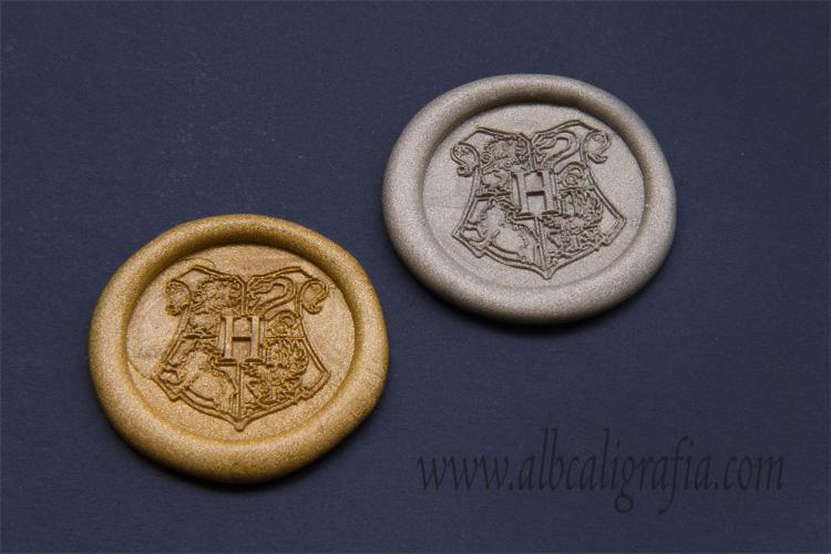 Gold and silver sealing wax medallions with sield