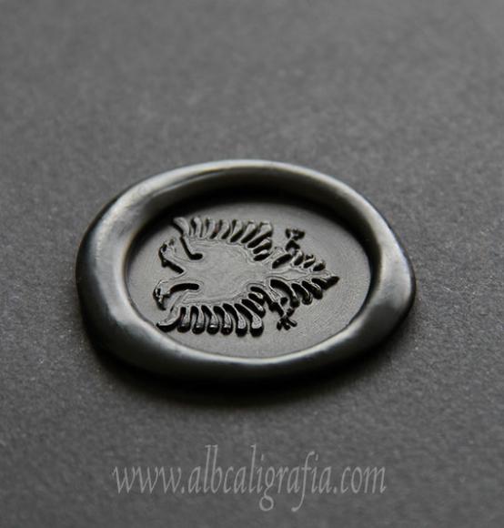 Black sealing wax medallion with bicefal eagle stampt