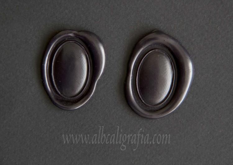 Black sealing wax medallions oval and convex 