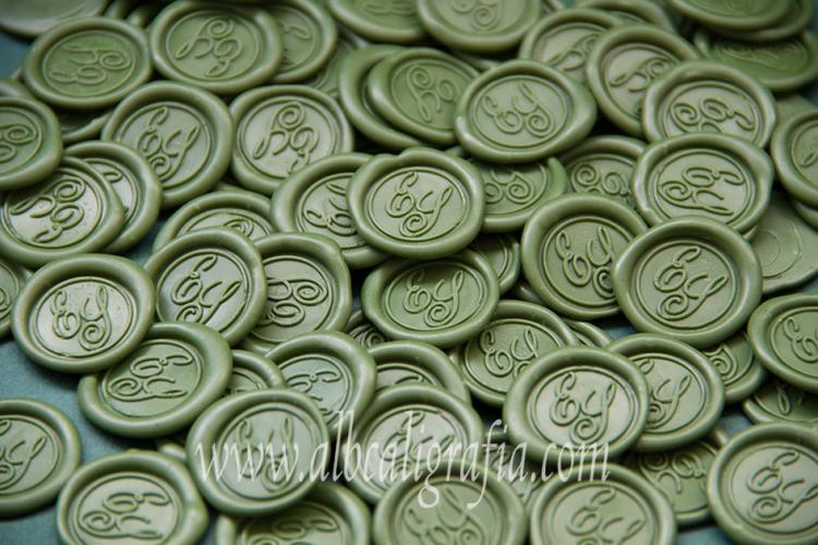 Green sealing wax medallions with initials ES