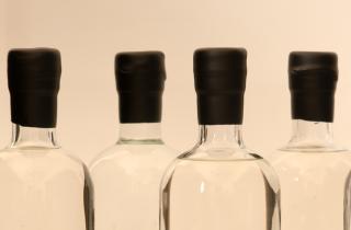 Transparent bottles with black sealing wax on the neck of the bottle