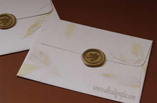 Handmade paper  envelopes  with gold sealing wax medallion
