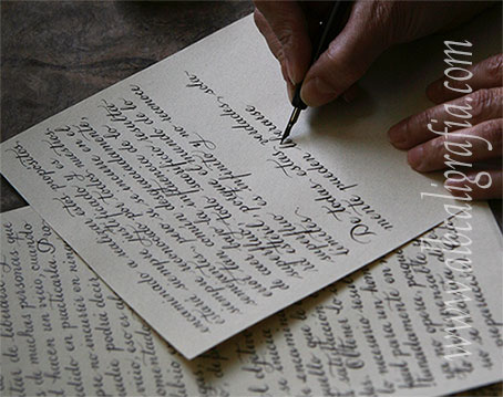 Letter writtenin calligraphy and hands of the calligrapher 